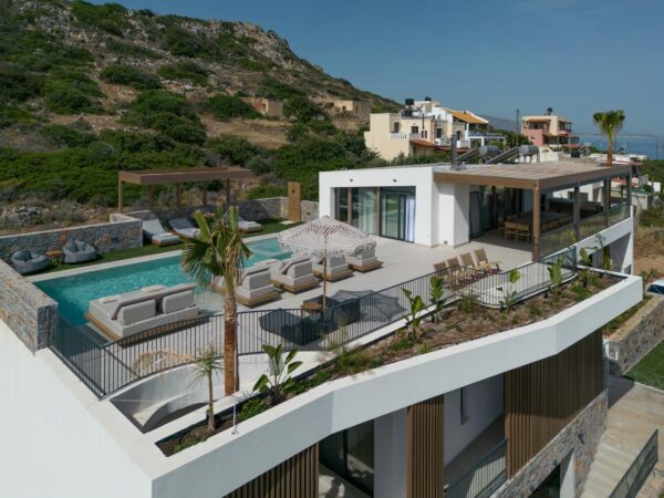 Summer Escapes Villa Si - Modern luxury villa with infinity pool, sea views, terraced gardens, and contemporary architecture overlooking Mediterranean coastline